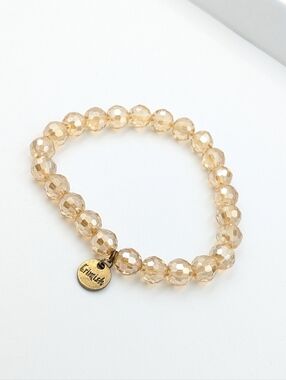 Erimish champagne colour very sparkly faceted beads stretch bracelet